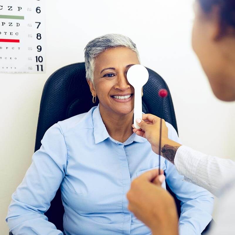 Woman having eye exam