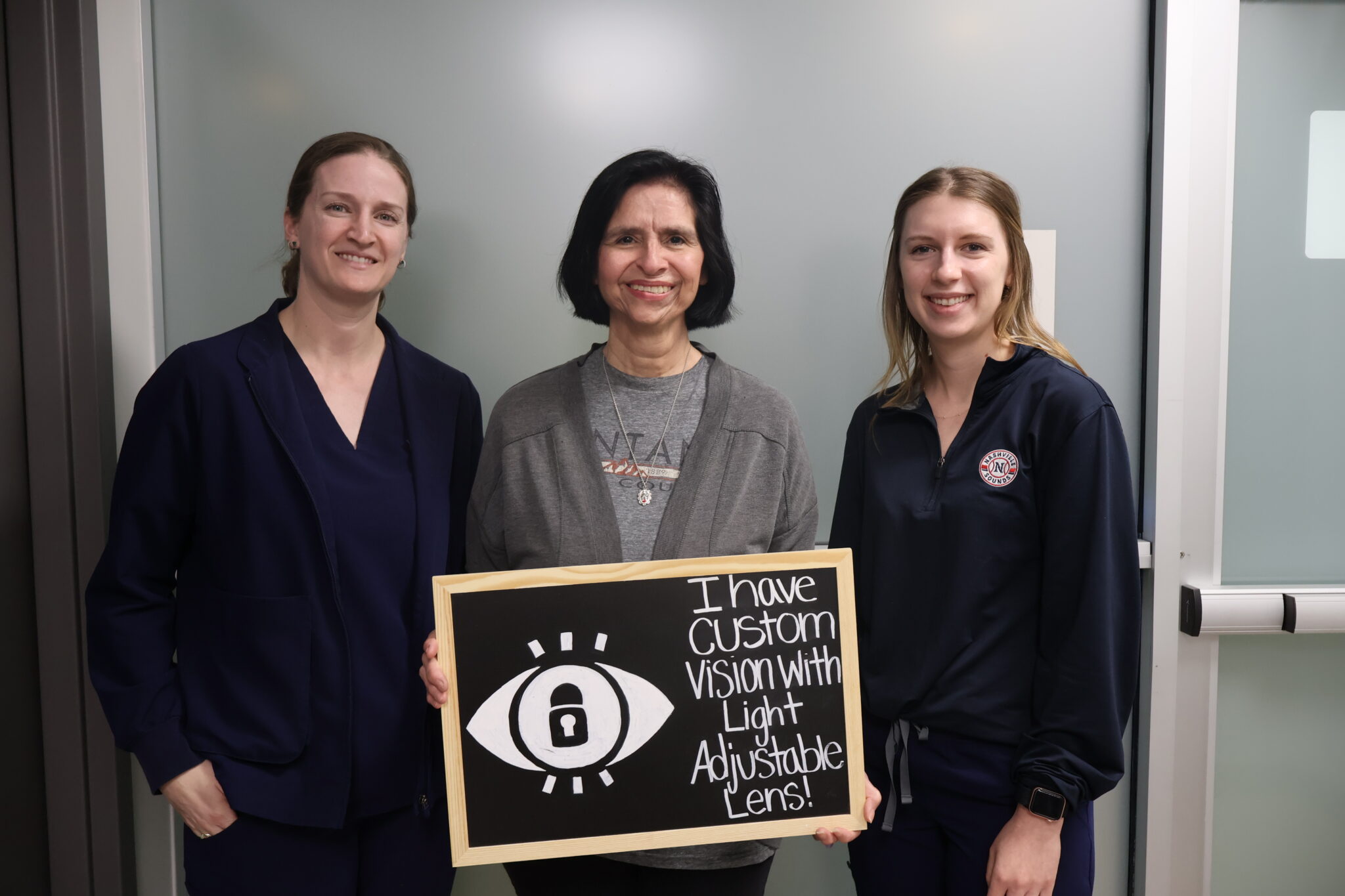 Kristi Sawall, NP, with patient during Light Adjustable Lens eye care visit in Laredo, TX.