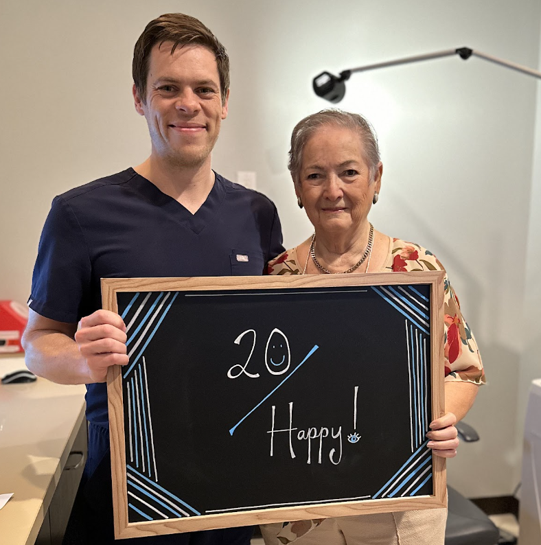 Patient celebrating improved vision at Physicians Eye Clinic of Laredo